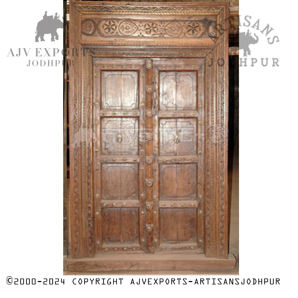 Simple wooden door with arch design